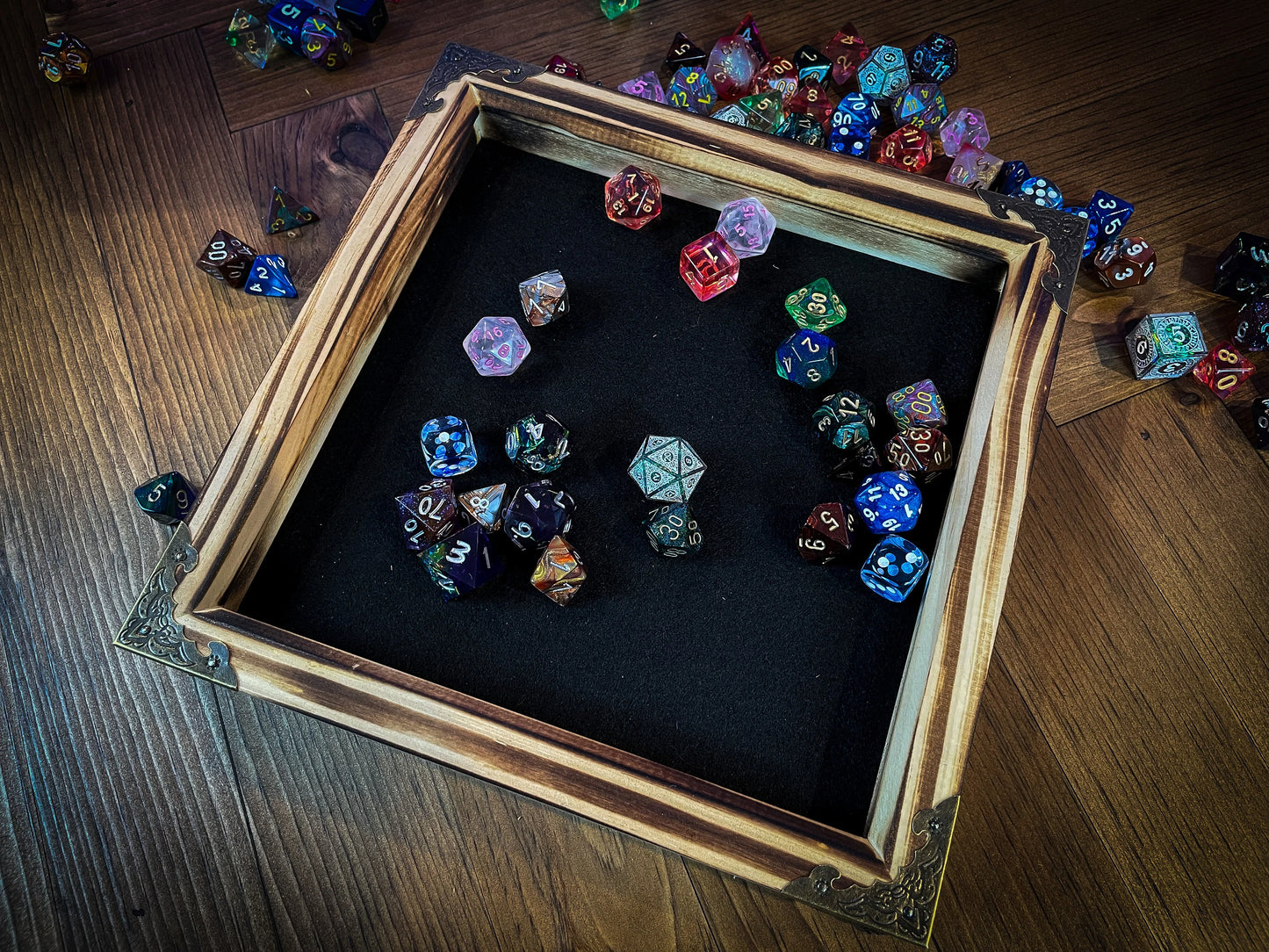 The Dragons Breath Dice Rolling Tray.  Our solid wood roll trays are hand charred and available in a choice of 9 colours and 3 sizes We first charr each tray with a blowtorch before staining in your choice of color, waxing and buffing it to give a long lasting shine and protection.