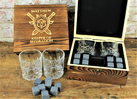 ersonalised Tabletop Gaming Design Whiskey Set.  This unique and fun sets contains a set of 6 whiskey stones engraved to look like dice and a cut glass tumbler - all in a solid wood engraved gift box.