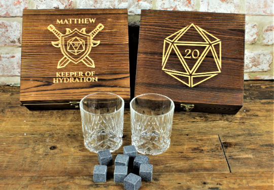 ersonalised Tabletop Gaming Design Whiskey Set.  This unique and fun sets contains a set of 6 whiskey stones engraved to look like dice and a cut glass tumbler - all in a solid wood engraved gift box.