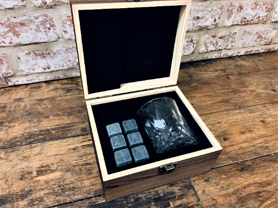 ersonalised Tabletop Gaming Design Whiskey Set.  This unique and fun sets contains a set of 6 whiskey stones engraved to look like dice and a cut glass tumbler - all in a solid wood engraved gift box.